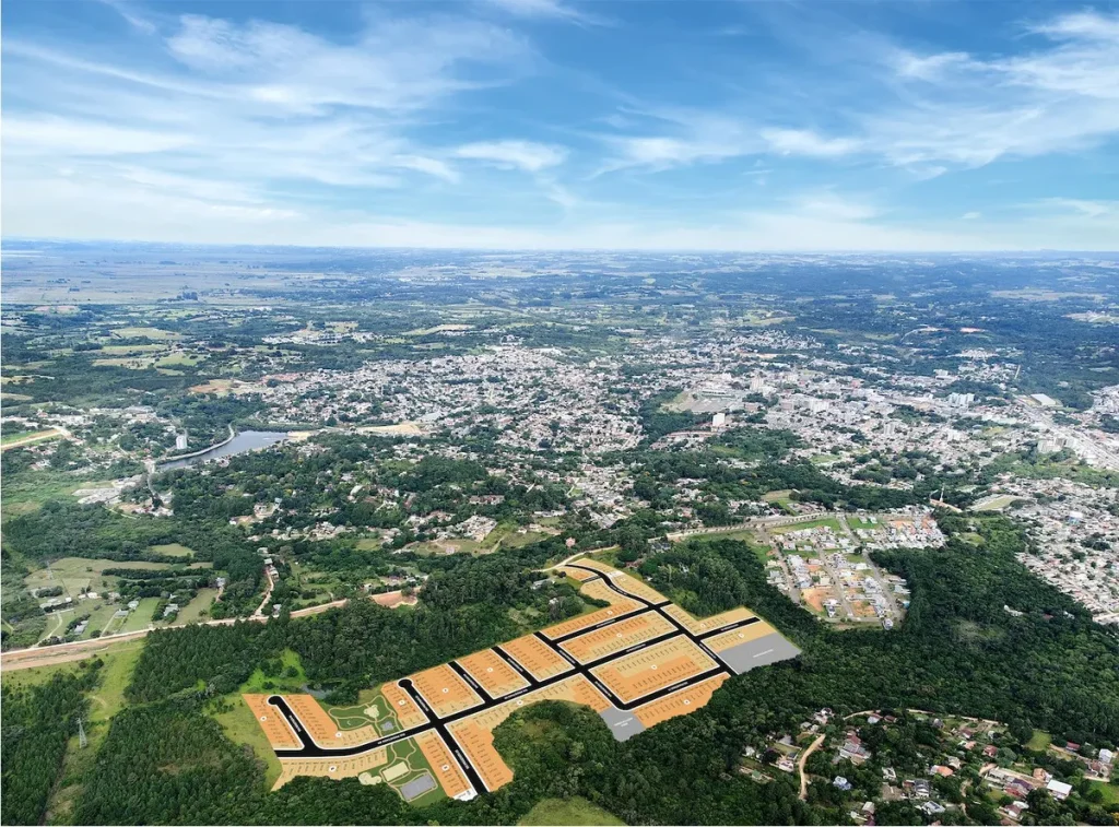Novo bairro planejado Residencial Jardim Madri em Viamão, Rio Grande do Sul, com ruas pavimentadas e casas em construção.