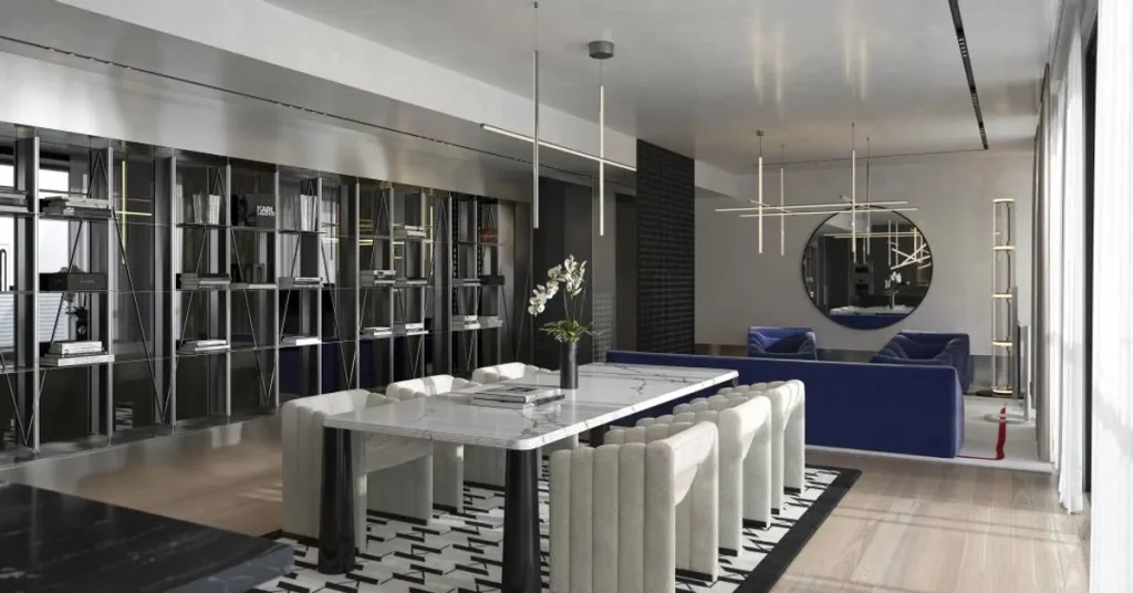 Edifício de ultra luxo Karl Lagerfeld Residences Lisboa com fachada moderna e gradiente vermelho.